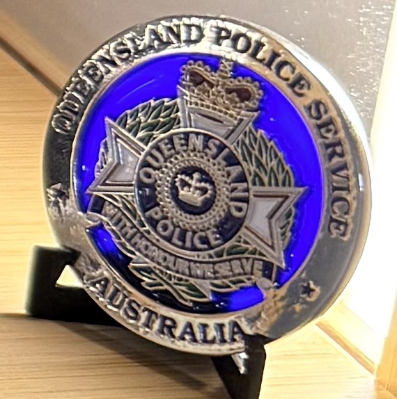 Qld police public common coin — back