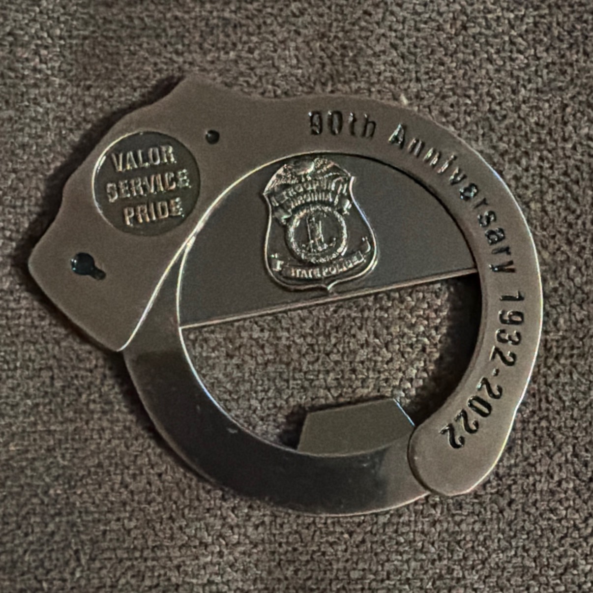90th anniversary handcuff — front