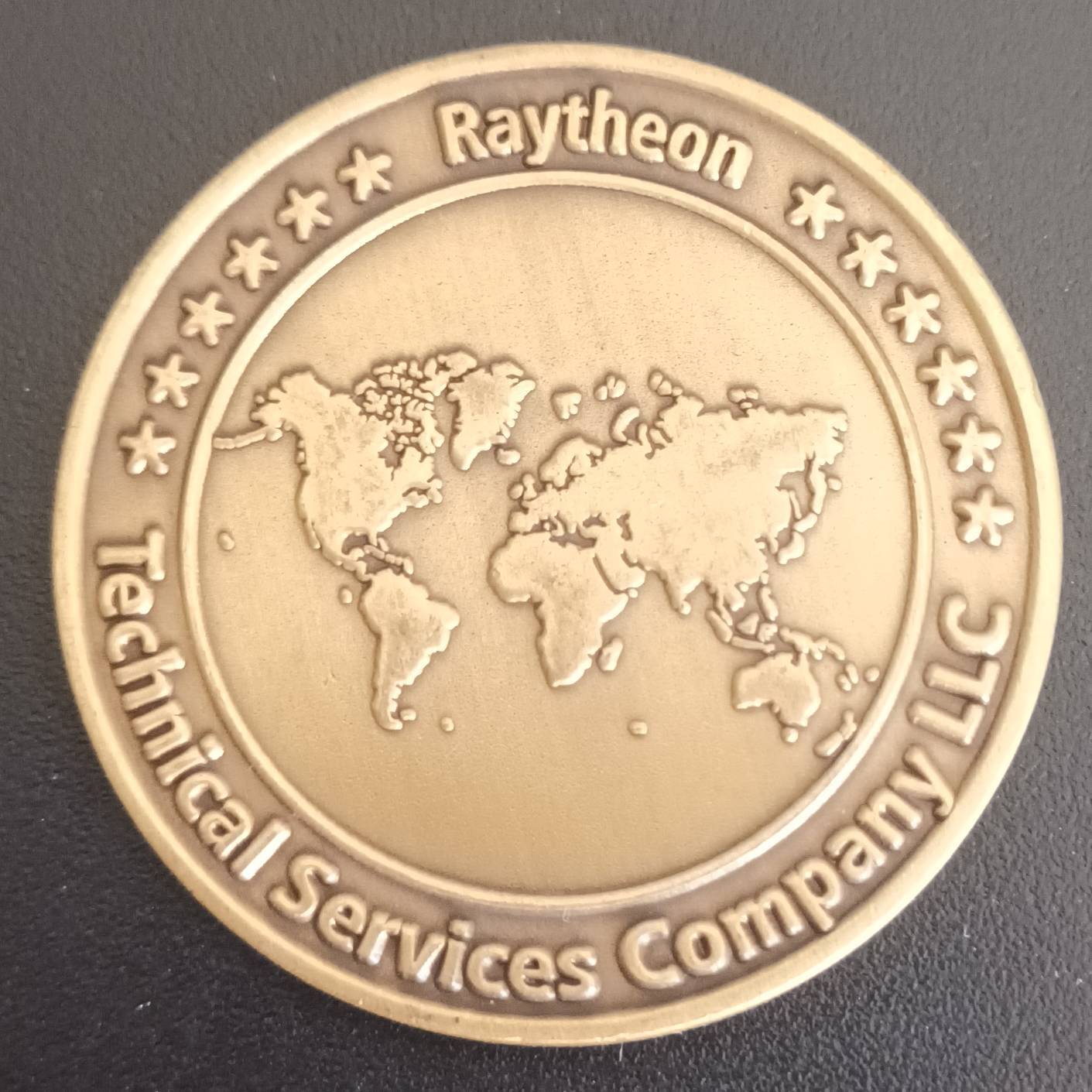 Raytheon John D Harris — back