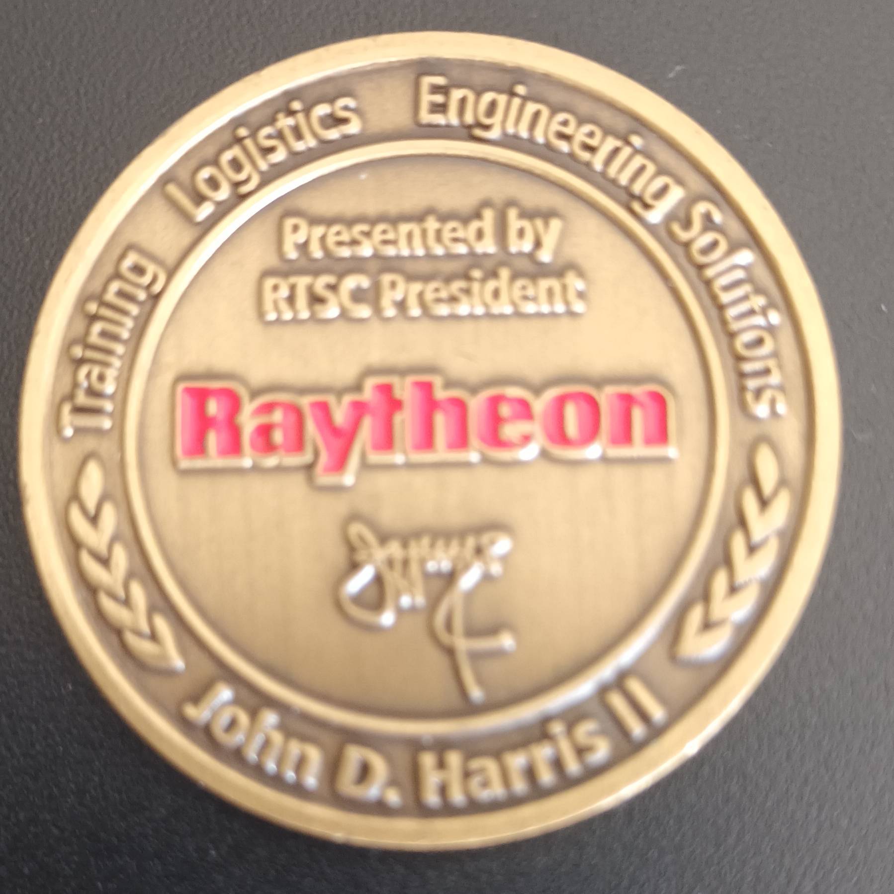 Raytheon John D Harris — front