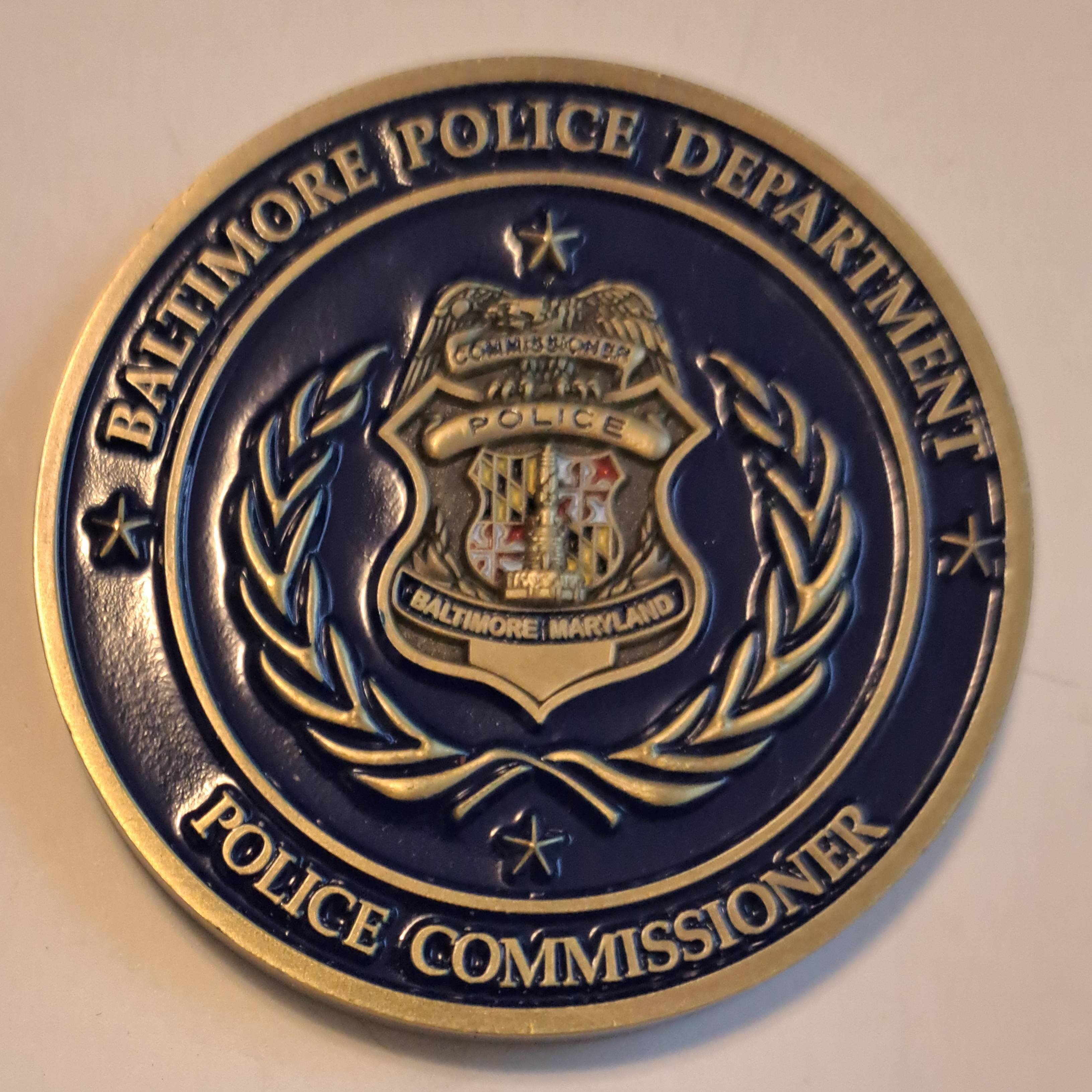 Commissioner — back