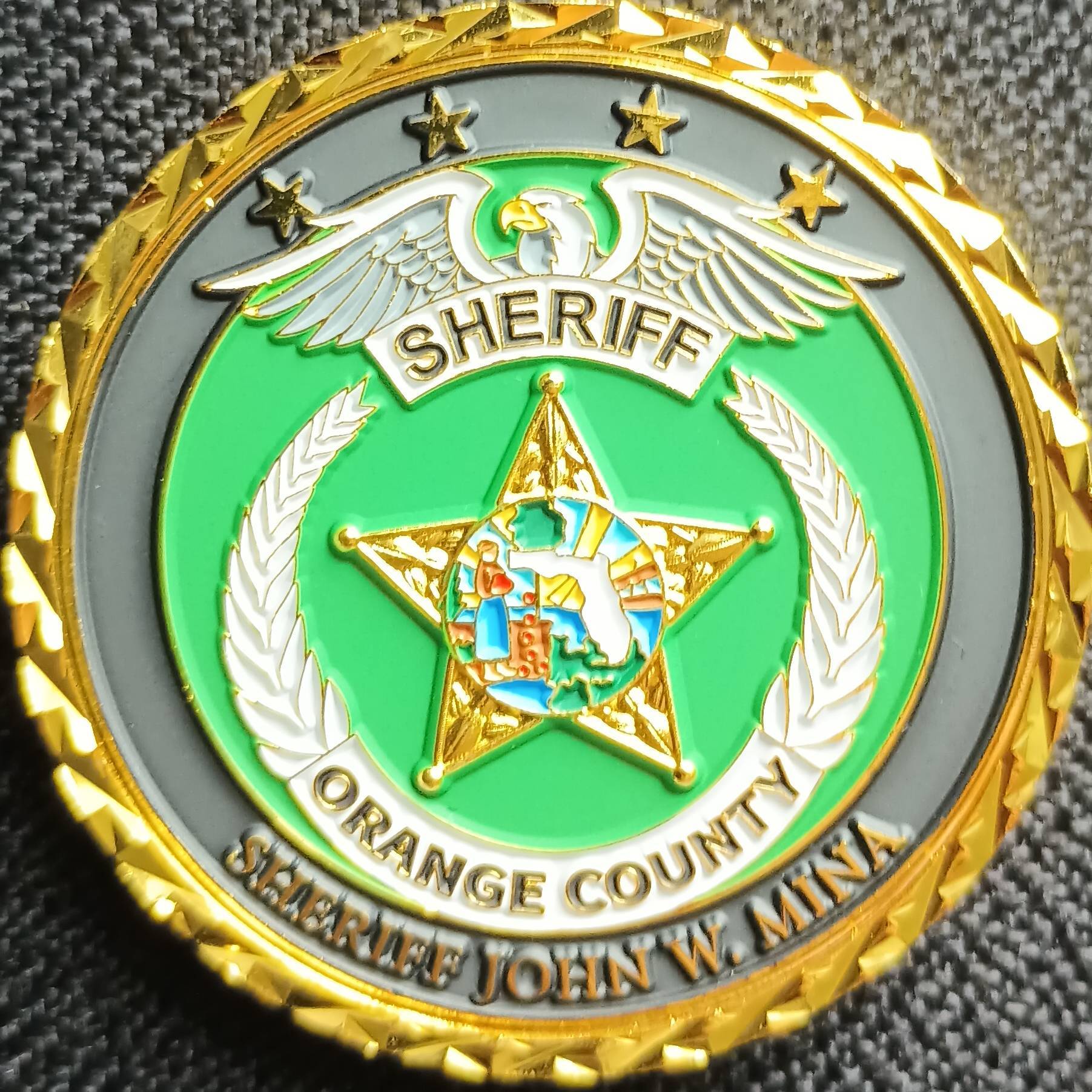 OCSO Sheriff John W. Mina — back