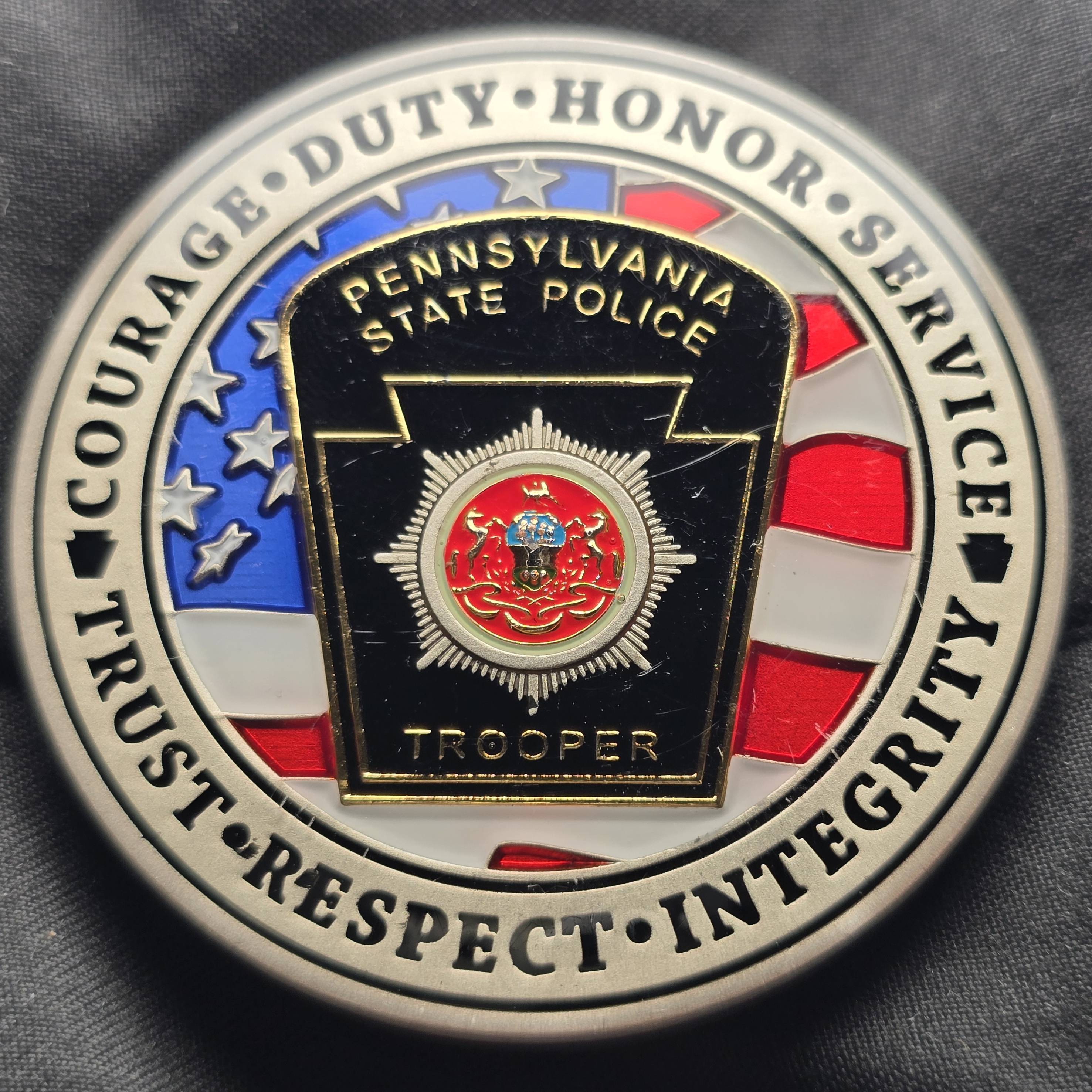 Pennsylvania state police retired trooper coin — front