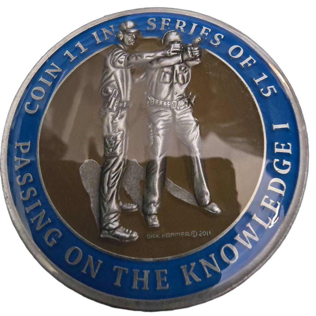 Dick Kramer coin 11 in a series of 15 Passing the knowledge  I — front