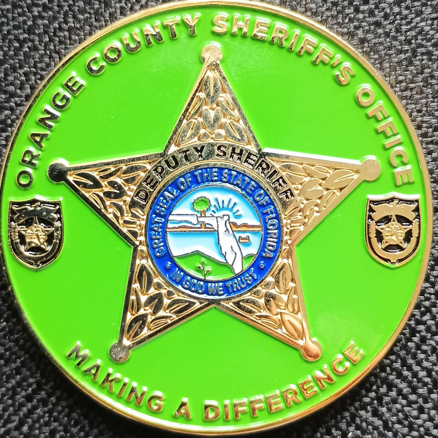 OCSO 1 of 7 coin set (Green Variant) — back