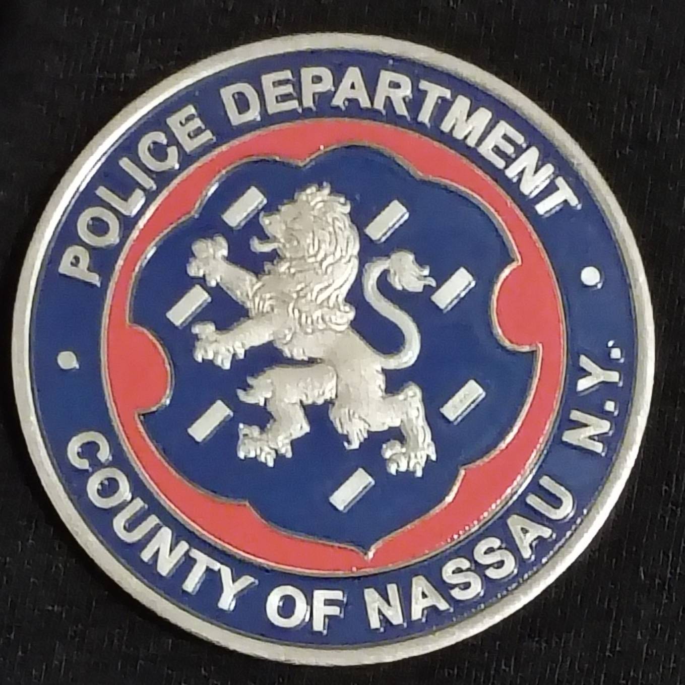 Nassau police pistol license section challenge coin — back