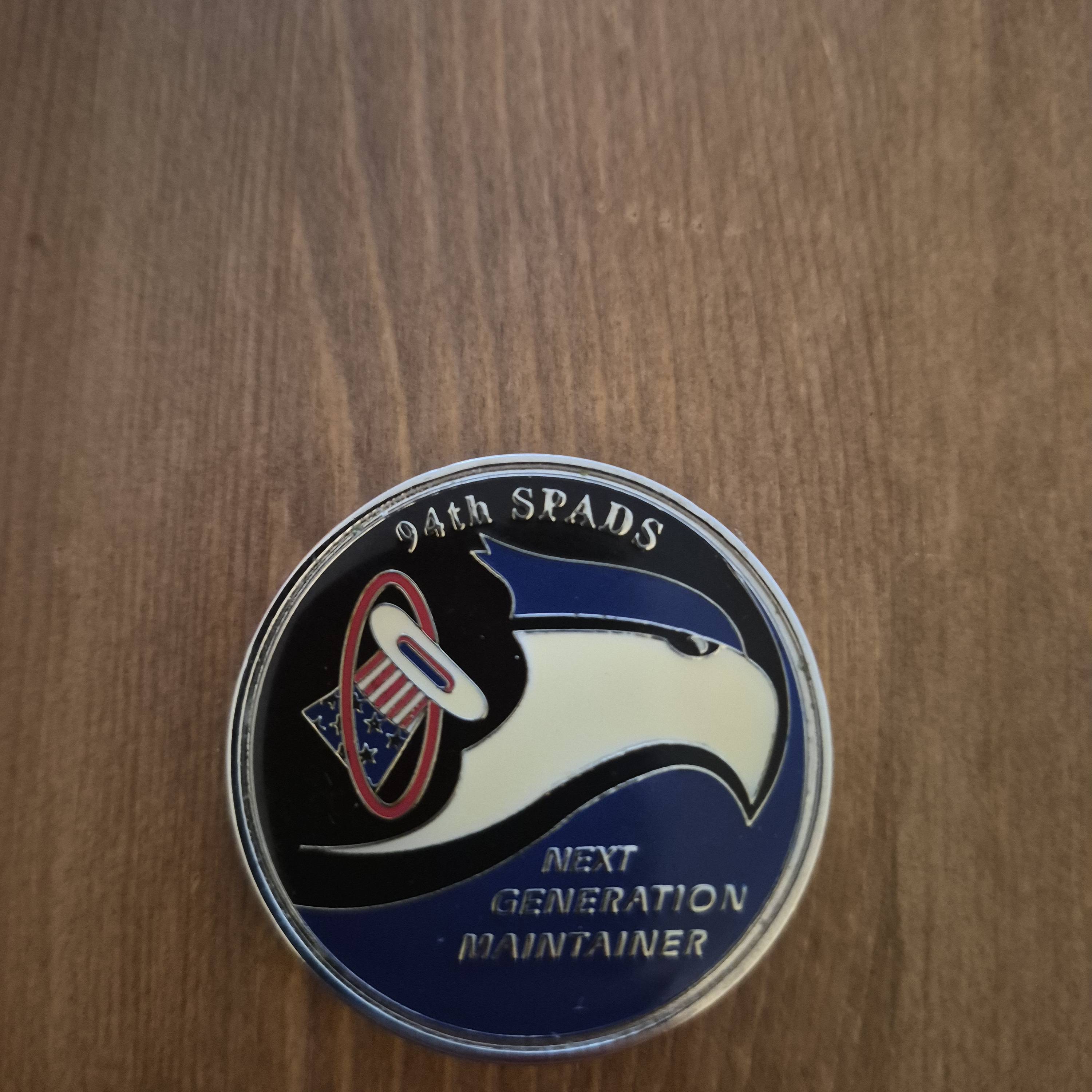 94th AMU challenge coin, hat in the ring — back