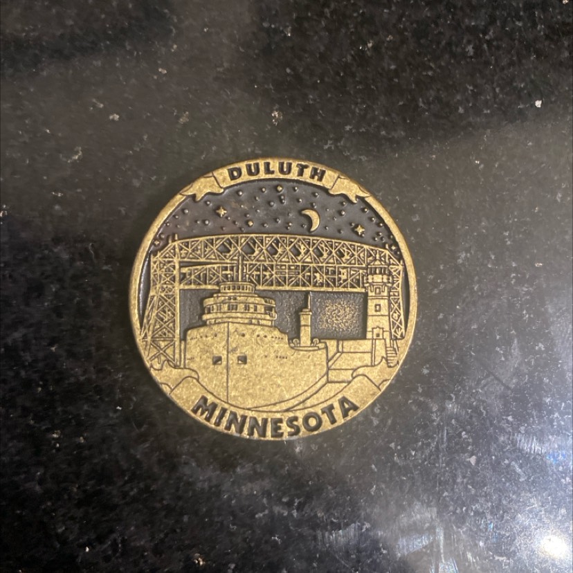 Duluth, Minnesota Aerial Lift Bridge Coin – A Story of Early Days — back
