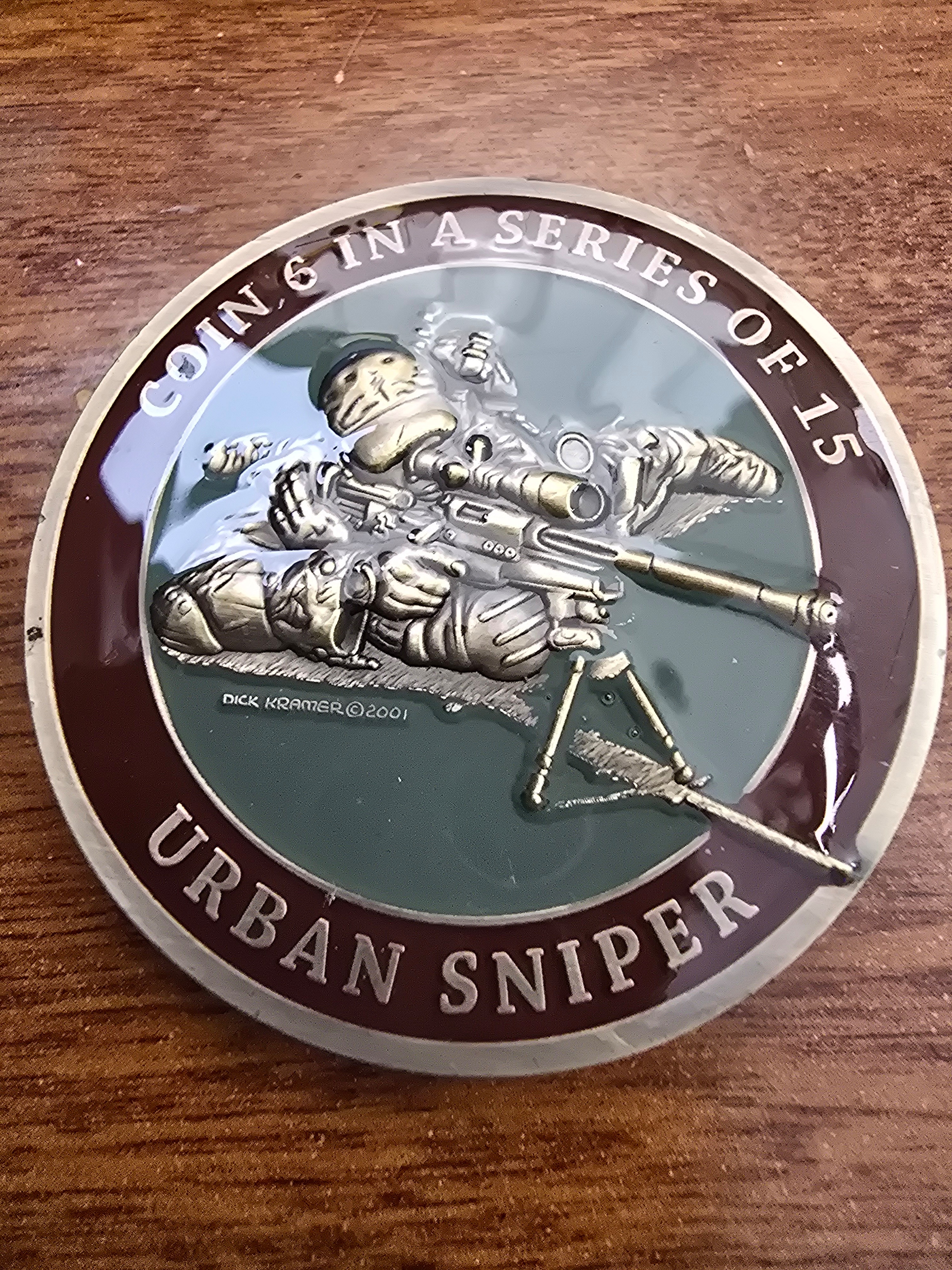 Urban sniper coin 6 in a series of 15 of Dick Kramer's top works of art — front